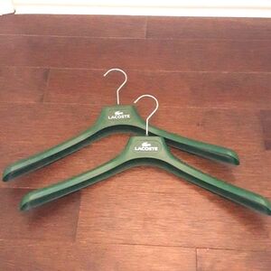 ^ Pair of vintage Lacoste coat / shirt hangers
